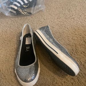 New slip on silver flats.